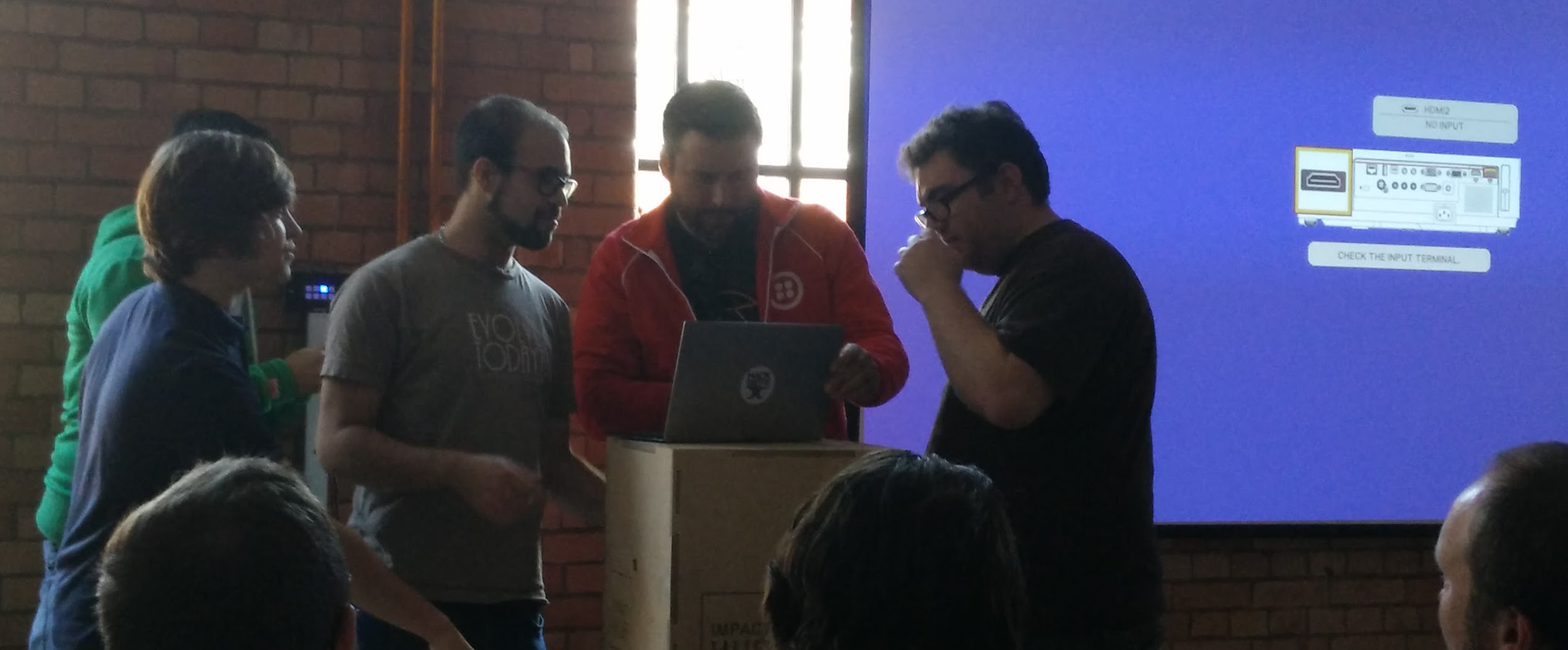 How many developers does it take to hook up a projector?